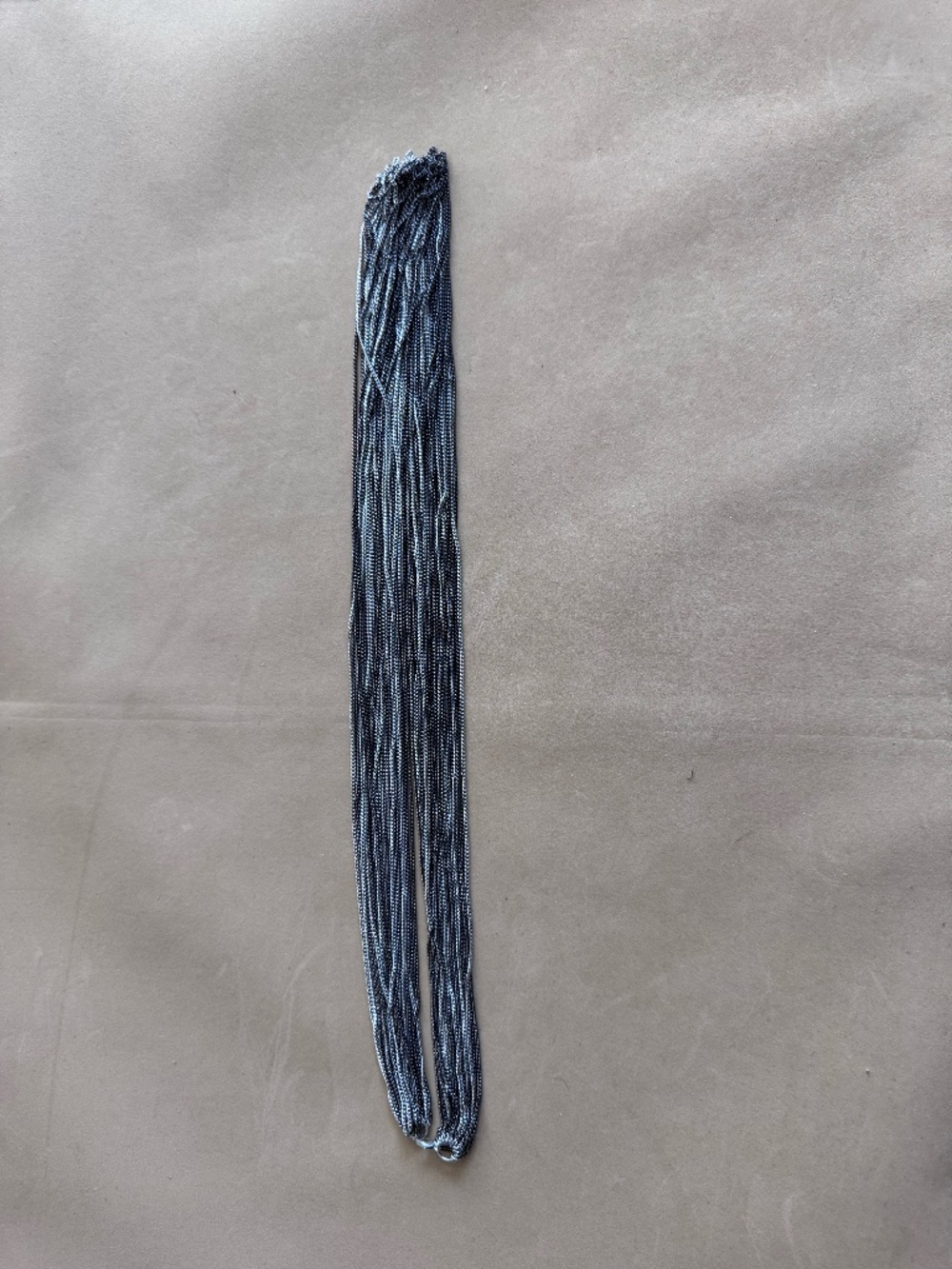 Multi-strand necklace of silver layered necklaces